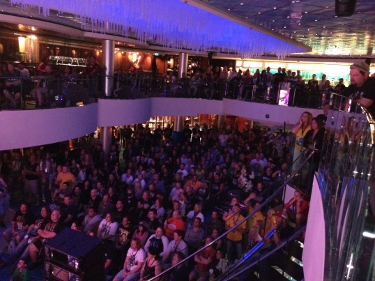 Fans in the Crystal Atrium watching a simulcast of the first indoor KISS concert.